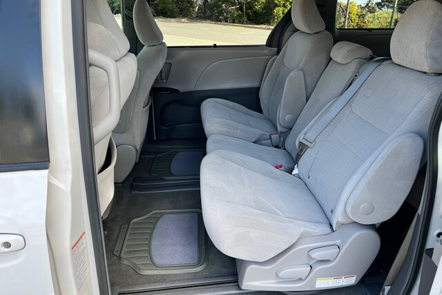 2016ToyoyaSiennaLE_White_Backseat